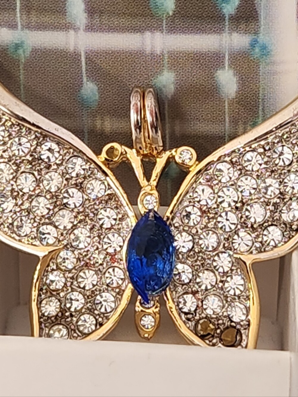 #2578, VTG SIGNED 1999 P.S CO. GOLD TONE RHINESTONE BUTTERFLY PENDANT.